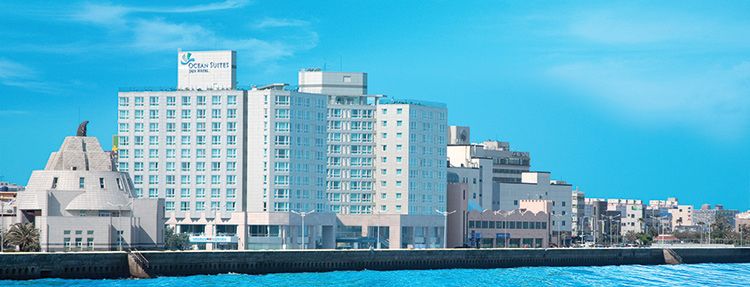 Exterior of Ocean Suites Jeju Hotel on the Tapdong waterfront